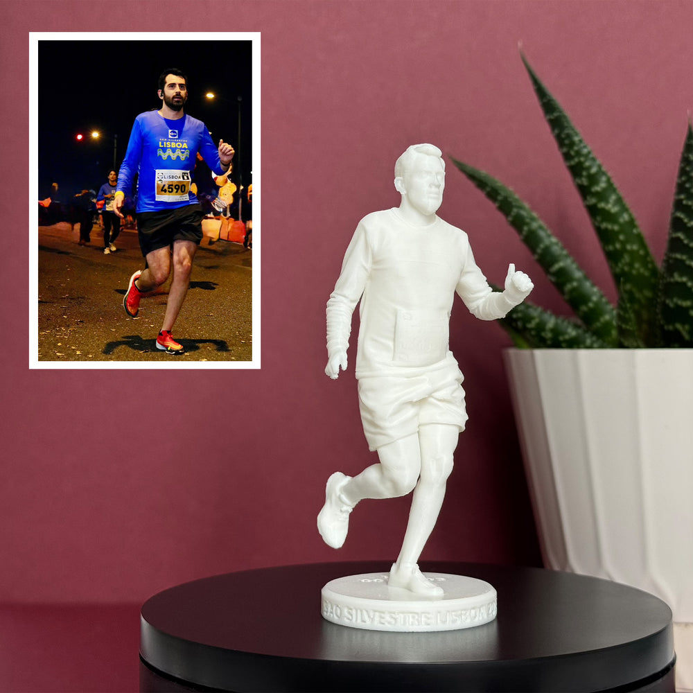 Unpainted custom figure of a runner mid-stride, made from a night race photo